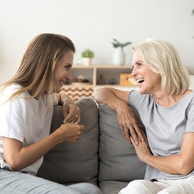 Ladies converse on couch