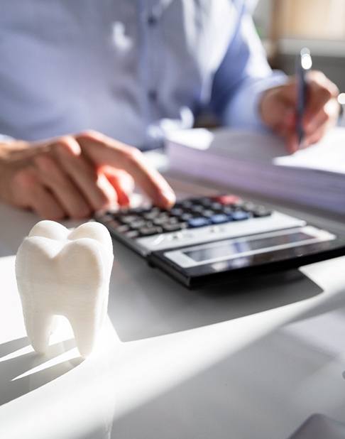 Calculator and cash on table