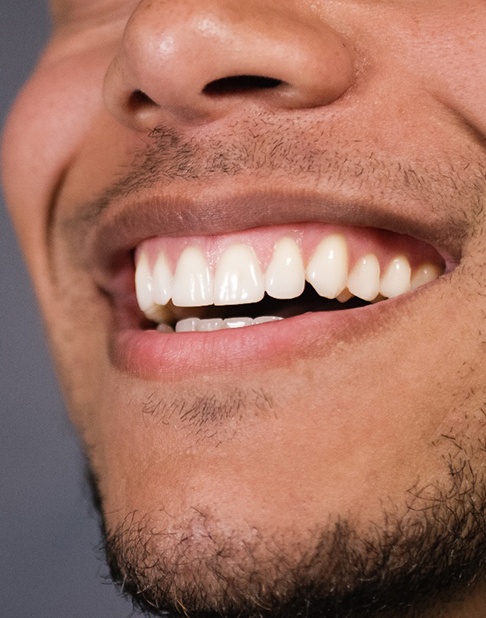 a close-up of a man’s smile