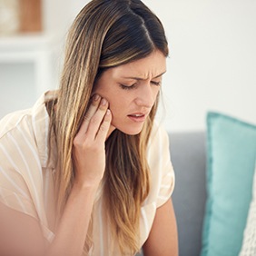 a patient dealing with dental soreness
