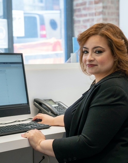 Dental team member processing dental insurance forms