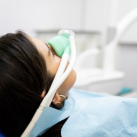 Dental patient wearing nasal mask for nitrous oxide