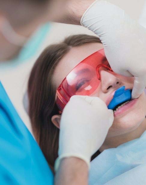 Patient receiving fluoride treatment