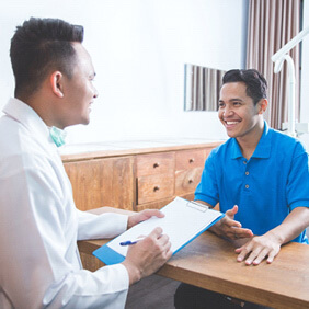 patient talking to dentist about financing options