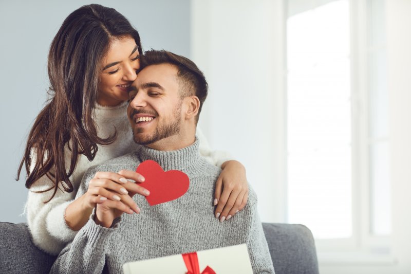 Couple giving valentines day gifts